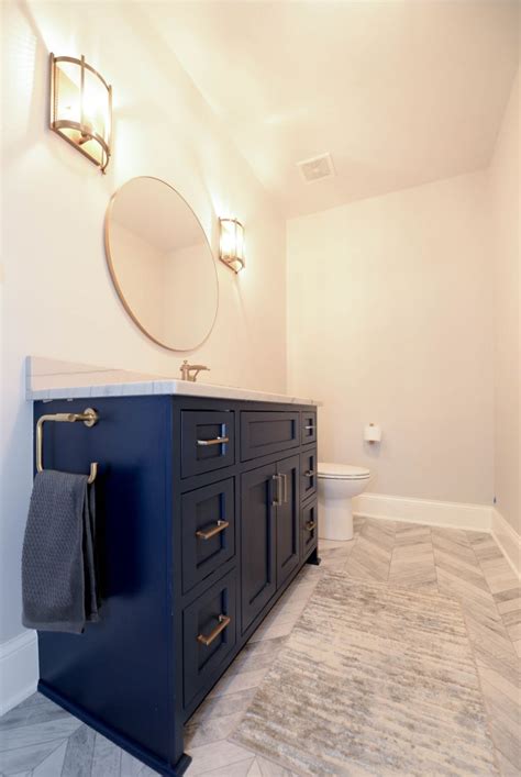 Bath hardware is comprised of all of the unique accents you need to give your vanity its personality and to ensure you're able to start your day in the best way possible. modern bath, bathroom vanity, navy vanity, gold hardware ...