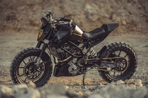Check out this ktm 200 duke modified with 3d printed parts. KTM Duke 390 Tracker by Revolt Cycles - BikeBound