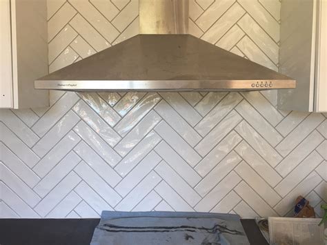 Once you add a color difference for this project, the grey grout choice also blends well with the blue and grey colors of the accent tile enchante charm used behind the stove and the dark blue island. Subways; A refreshing look from the underground - Articles