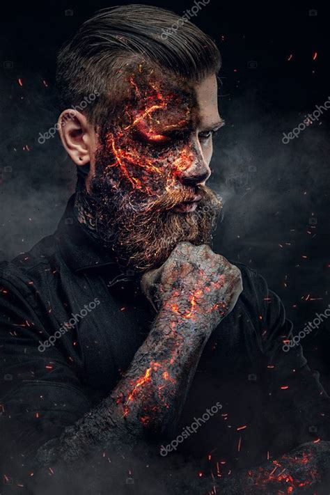 Creepy Demonic Male In A Fire Sparks Stock Photo By ©fxquadro 127917510