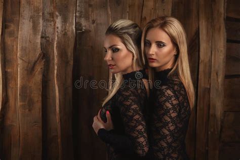 lesbian lovers foreplay at wall with handcuffs and whip stock image image of erotic girl