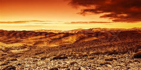 Photo Of Beautiful Red Dramatic Sunset In Desert Sandy Mountains
