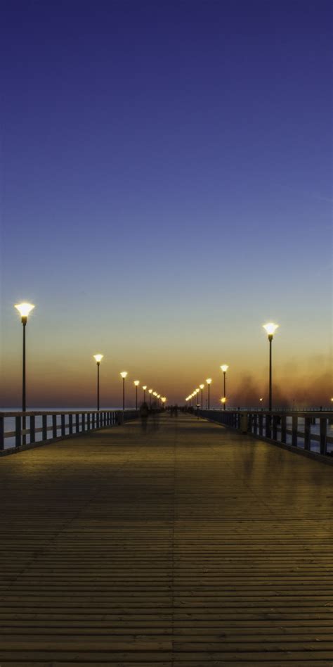 Download 1080x2160 Wallpaper Bridge Pier Wooden Night Out Sunset