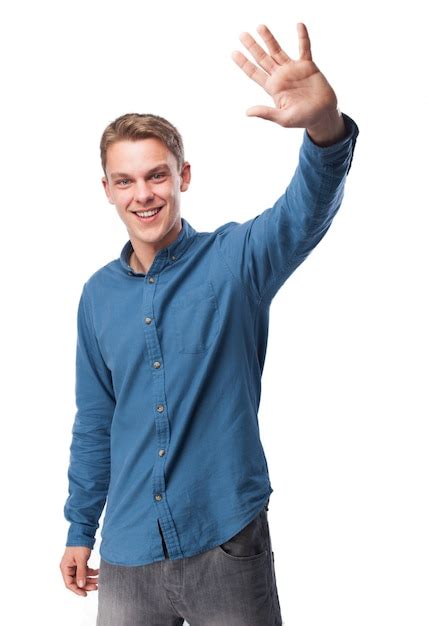 Man Waving Hand While Smiling Photo Free Download