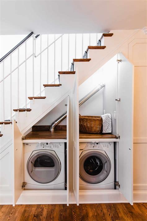 10 Inventive Ideas For That Space Under The Stairs Hidden Laundry