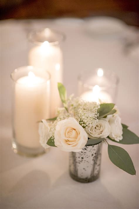 Simple Elegant Centerpiece With Candles Cylinders And A Small