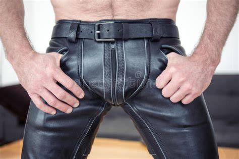 Close Up Of Man Wearing Black Leather Pants Stock Image