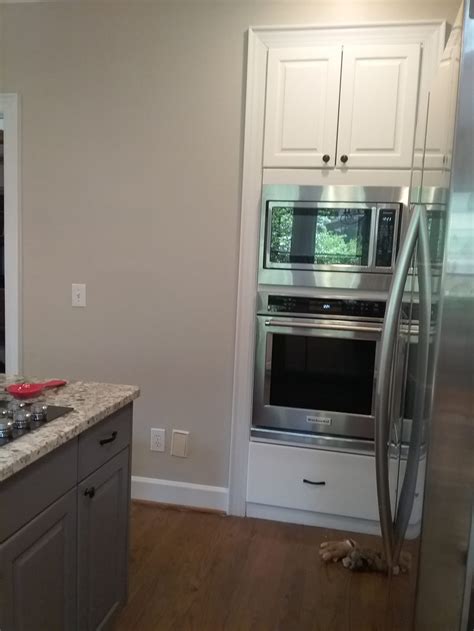 A hint of purple gives this deep, dark gray a sexy, slightly forbidden quality that feels especially alluring in a dressing or powder room. Extra White & Temptation Kitchen - 2 Cabinet Girls