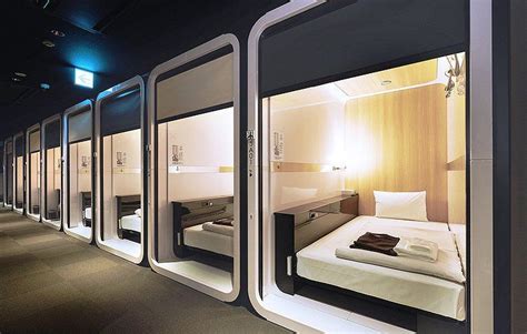 The capsule is sealed with a door or a curtain and bathroom facilities are normally shared. Business Class capsule pods at First Class Hotel | Hotel ...