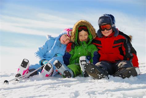 Children Playing In Snow Stock Image Image Of Pleased 4123157