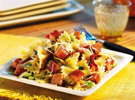 Cook fettuccine according to package directions; Simply simmer Hillshire Farm® Smoked Sausage and pasta in ...