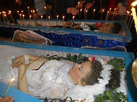 Russian Woman In Her Open Casket During Her Funeral