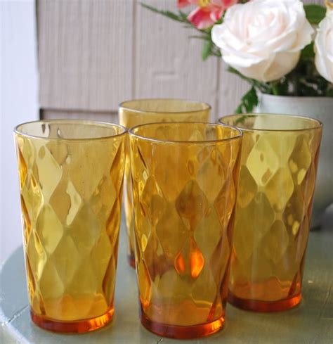 Beautiful Set Of Four Amber Colored Drinking Glasses By Rejive