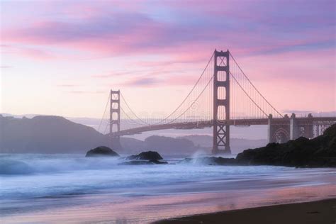 classic panoramic view of famous golden gate bridge seen from scenic baker beach in beautiful