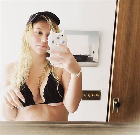 Kesha Flaunts Major Underboob As She Struggles To Contain Assets In Too