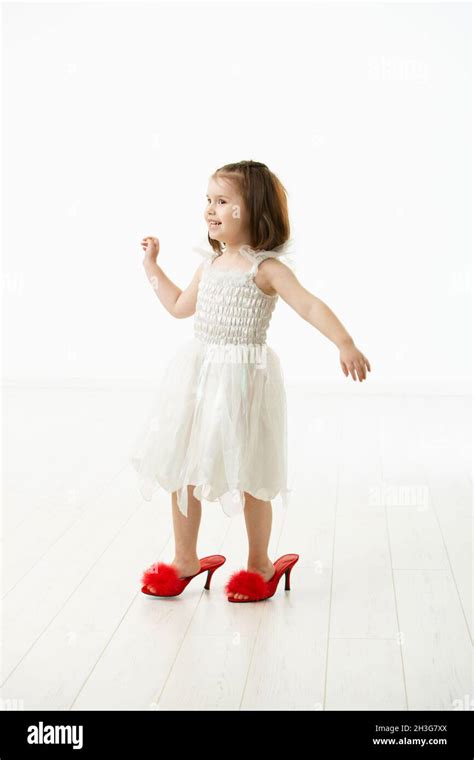 Little Daughter Trying Mothers Shoes Stock Photo Alamy