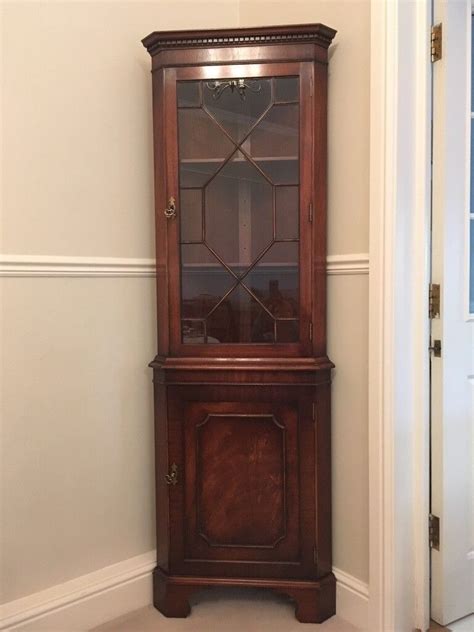 Reproduction Mahogany And Glazed Standing Corner Display Cabinet In