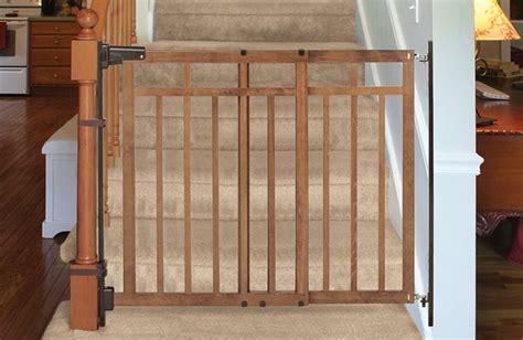 There are some stair gaurds that hook on to the railing of the stairs or maybe drill into the wall. Summer Infant - Banister & Stair, Top of Stairs Gate with ...