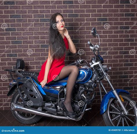 Girl In Red Dress On A Motorcycle Stock Image Image 49409781