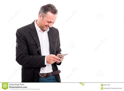 Happy Young Businessman Reading Text Message On Cellphone Stock Image