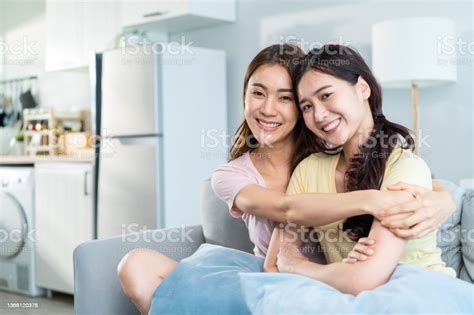 portrait of asian beautiful lesbian woman couple smile look at camera attractive two female gay