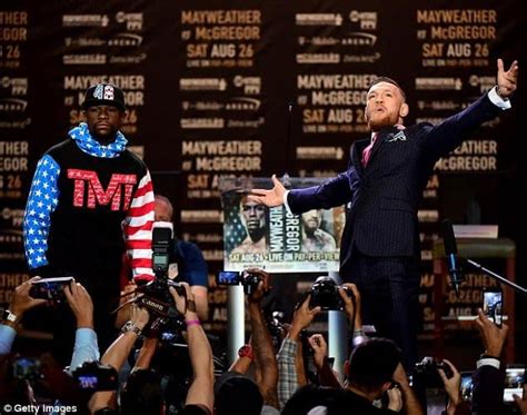 Conor Mcgregor Wears Suit Pinstriped With F K You To Insult Floyd Mayweather Elite Readers