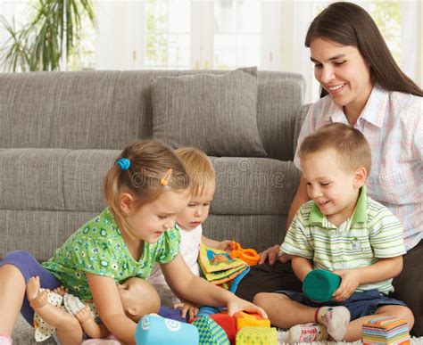 Mother Playing With Children At Home Stock Image Image Of Brothers