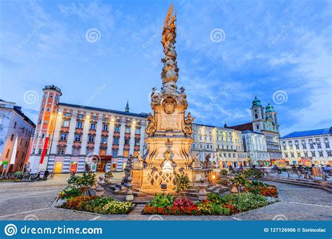 Linz Austria View Of The Main Street With Walking People Yellow Tram And Old Colorful