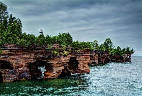 Devils Island Sea Caves Photograph By Deborah Klubertanz Pixels