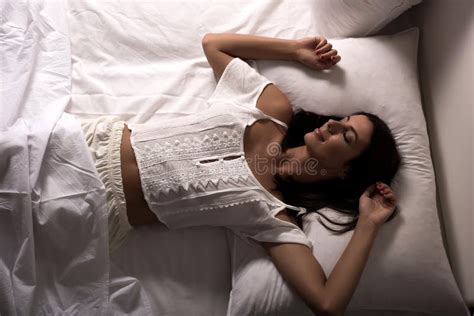 Beautiful Woman Laying In The Bed At Night Stock Photo Image Of Lazy