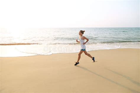 Morning Jogging On The Beach Stock Photo Image Of Lifestyle Action
