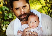 John Stamos Hits the Pool with Baby Son Billy | PEOPLE.com