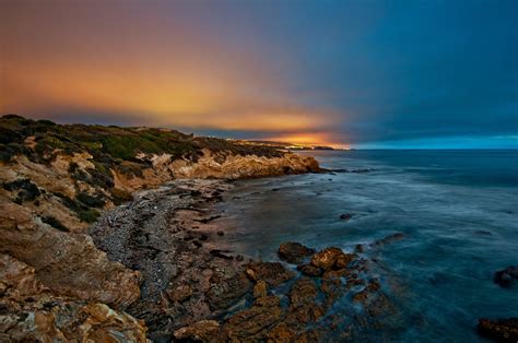 Sea Beach Stones Evening Dusk Lights Sunset Ocean Wallpapers Hd
