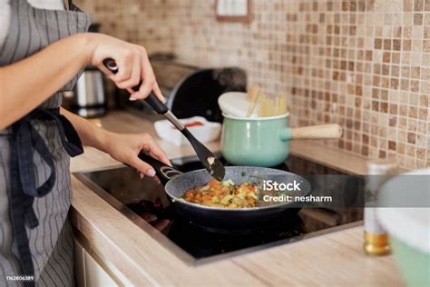 Woman Cooking Dinner Stock Photo Download Image Now Adult Adults
