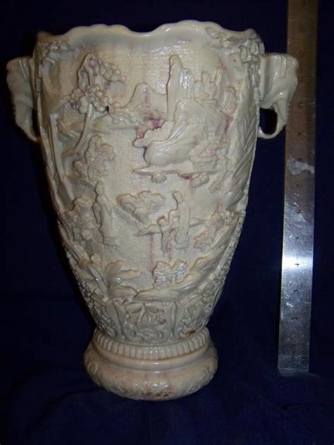 Oriental Porcelain Vintage Faux Ivory Elephant Head Vase Was Sold For