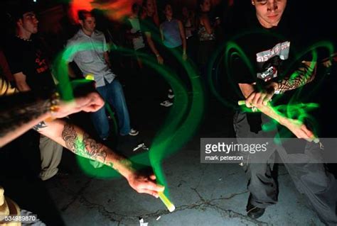 Glow Sticks Dance Photos And Premium High Res Pictures Getty Images