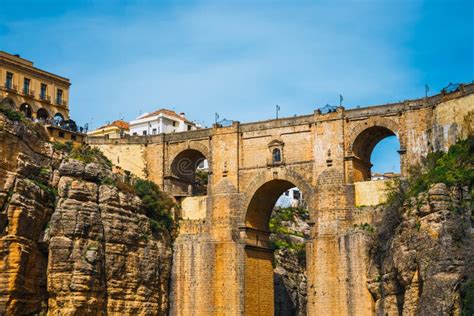 Stone Bridge Over The Gorge Of Tajo In Ronda Andalusia Spain Stock