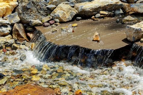 Premium Photo Amazing Waterfall Azure Lake With Crystal Clear Water