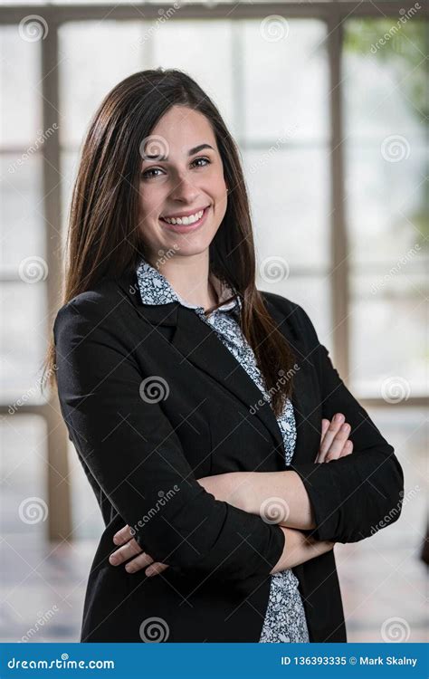 Portrait Of A Young Beautiful Well Dressed Business Woman Stock