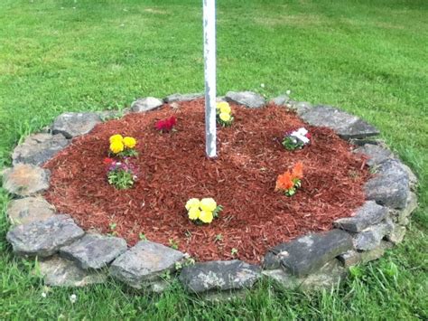 Residential front yard flag pole. Simple landscaping | Flag pole landscaping, Landscaping ...