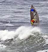 Small Boats In Big Waves Photos