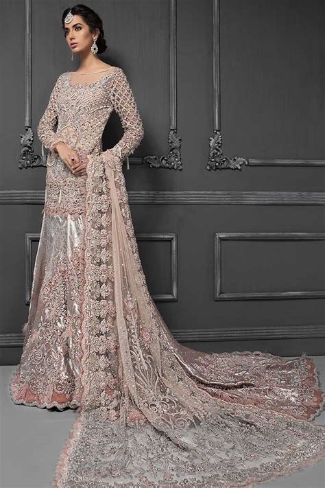 An expression of royal mughal era, this classical bridal master replica from the latest designer bridal collection unveils the vintage craftsmanship. Pakistani Designer Bridal Dresses Maria B Brides 2020-2021 ...