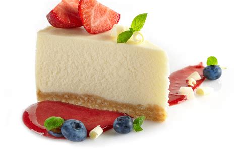 Download Slice Of Cheesecake With Berries Wallpaper