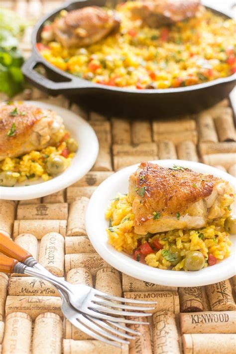 The arroz con pollo recipe, a chicken and rice plate with vegetables, is one of the most quintessential dishes from spain and latin america. Spanish Arroz con Pollo (Chicken with Rice) - Dinner at ...