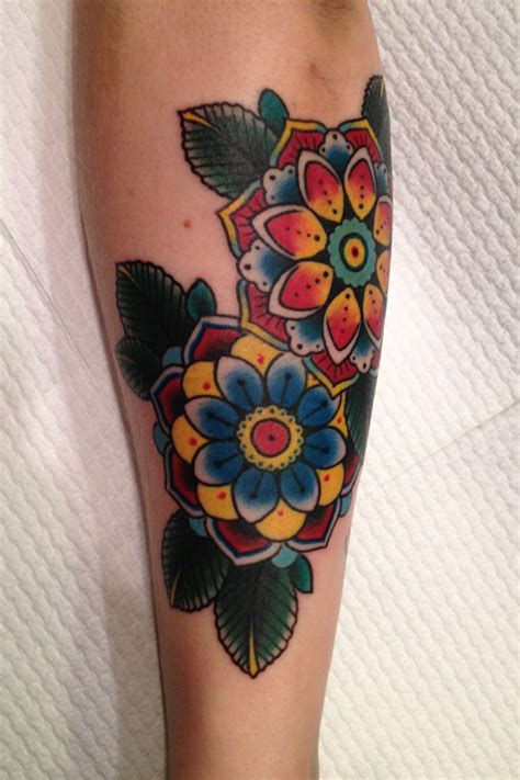 The superb flower tattoo design is painted with black color and this particular tattoo has been inspired by the traditional tribal tattoo designs which cover a major area with patterned floral prints. Traditional Tattoos Designs, Ideas and Meaning | Tattoos ...
