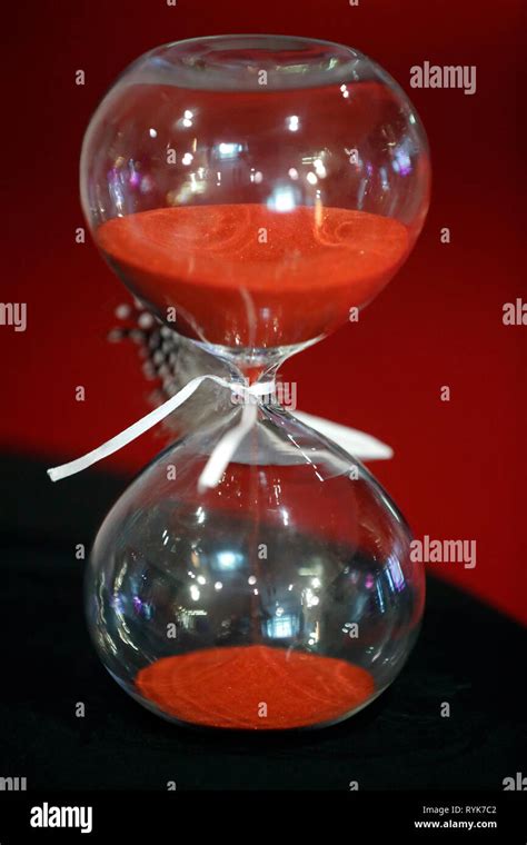 Red Sand In An Hourglass France Stock Photo Alamy