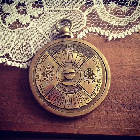 2 papers a4 (only have 2 layers) 1 50 Year Perpetual Calendar Pendant Antique Brass Really