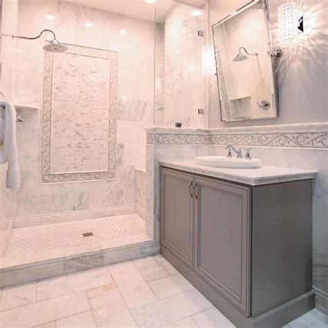 Caitlin wilson's bathroom here absolutely leans more elegant but it shakes up the typical white marble + white cabinet + white subway tile look that we've all seen time and again. Hampton Carrara Polished Marble Wall Tile - 8 x 19.5 in ...