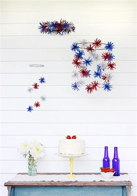 diy mini firework pom pom mobile the merrythought 4th of july celebration 4th of july party