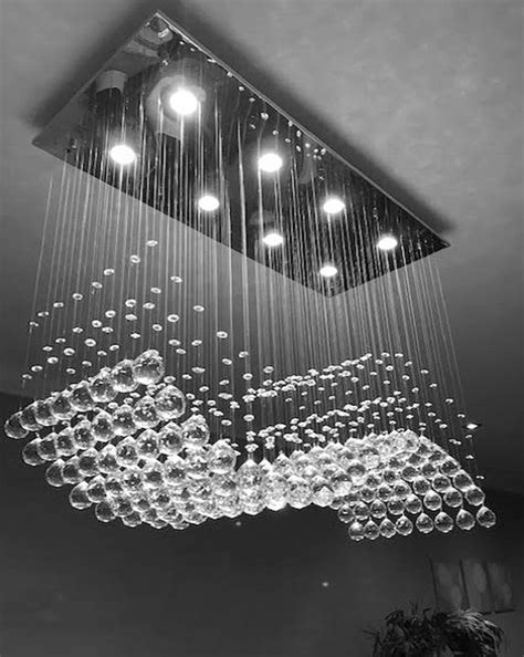 Chandeliers for dining room use don't need to be overly bright, but need to put off enough light to eat by. Rectangular Raindrop LED Modern Dining room Crystal ...